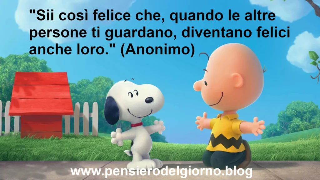 Frase con immagini Snoopy sulla felicità