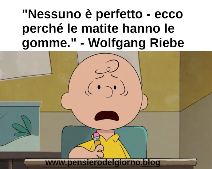 Frase con immagine Snoopy Charlie Brown Nessuno è perfetto